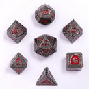Hymgho Solid Metal Sorcerer RPG Dice set - Gunmetal w/ Red Glitter